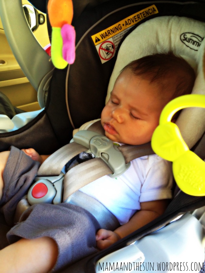 4 month old G passed out in his car seat listening to his favorite band, the Vespers